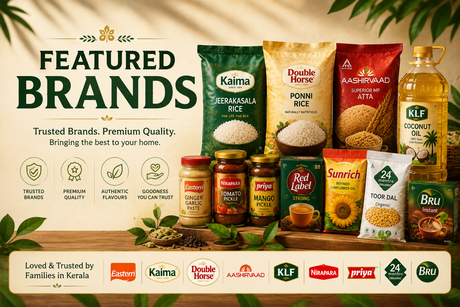 A promotional banner featuring multiple branded food products arranged on a wooden board with decorative leaves and text. 